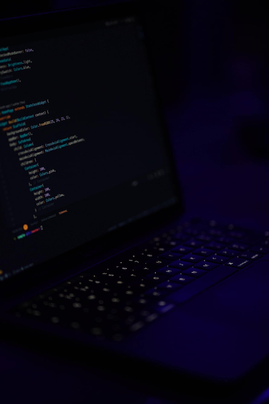 Dark Mode Programming on a Laptop Screen with Syntax Highlighted Code HD phone wallpaper