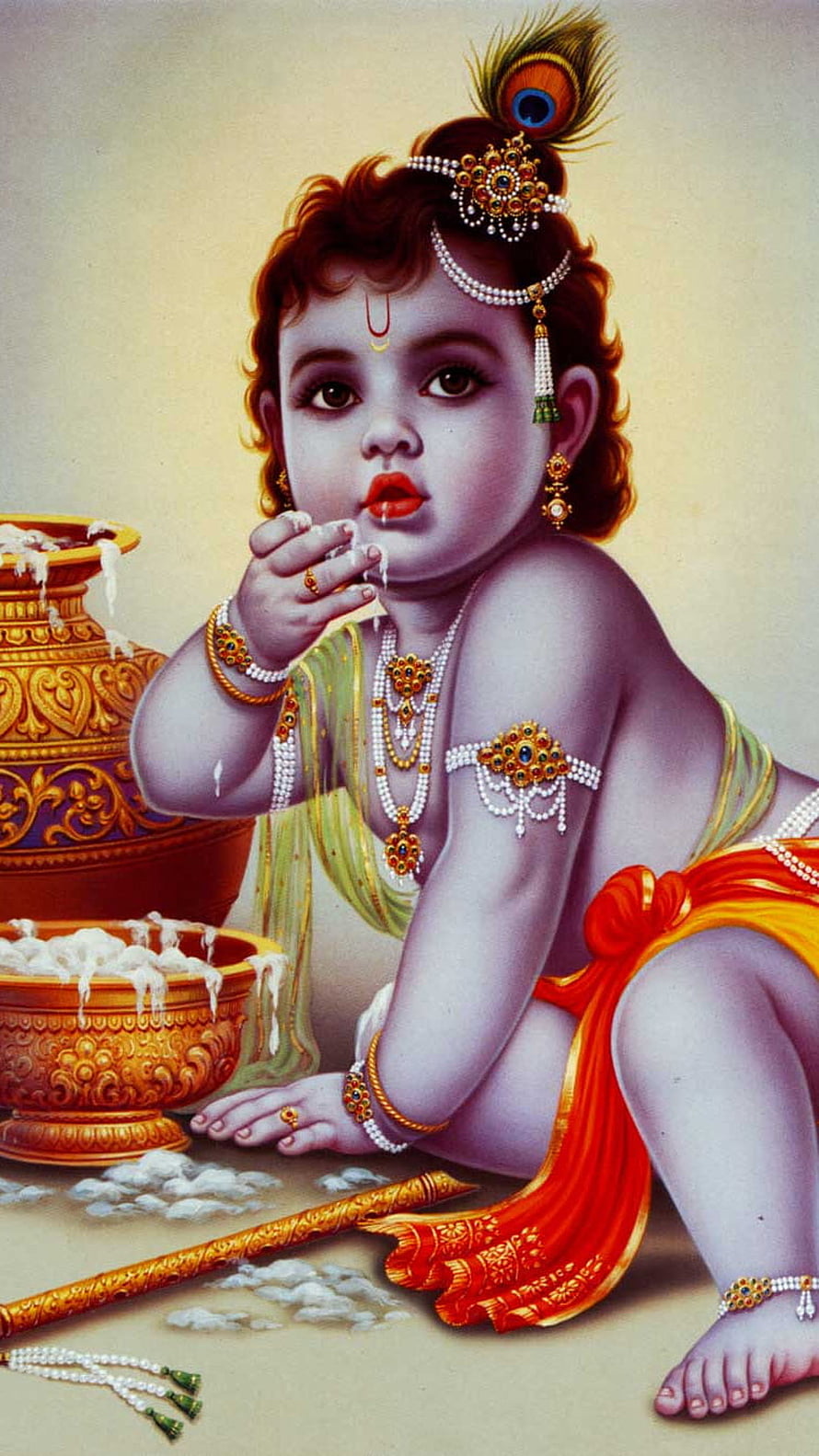 Baby Krishna Eating Butter with Peacock Feather Crown and Golden Ornaments HD phone wallpaper