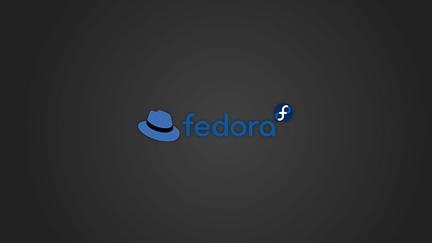 Fedora Linux Official Logo with Blue Fedora Hat on Dark Background HD wallpaper