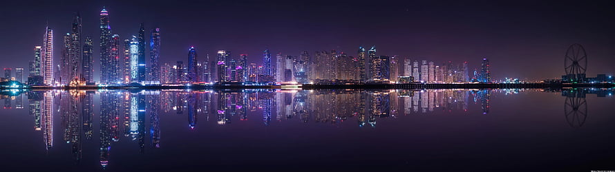 Doha Skyline Night Panorama With Reflections In The Water HD wallpaper