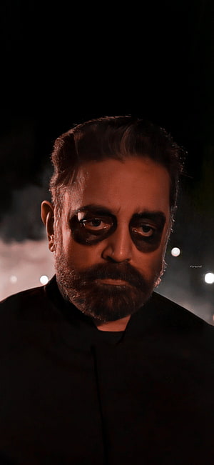 Kamal Haasan as Vikram in Dark Cinematic Portrait with Intense Gaze HD phone wallpaper