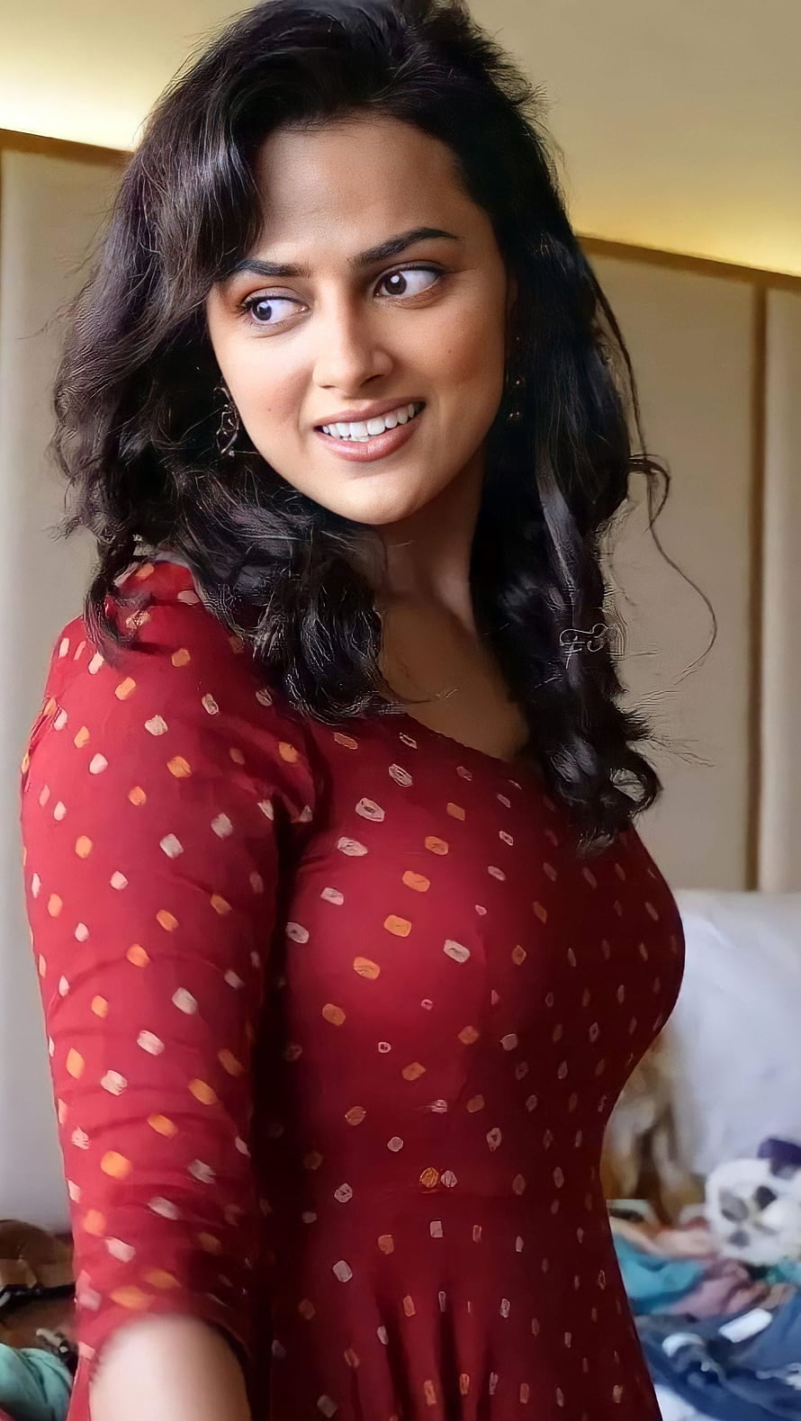 Shraddha Srinath in a red polka dot dress with long wavy hair HD phone wallpaper
