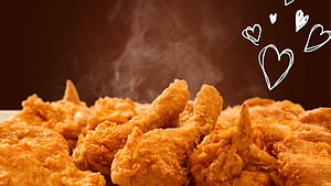 Steaming Golden Fried Chicken Drumsticks with Crispy Texture and Heart Illustrations HD wallpaper