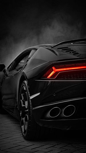 Black Lamborghini Huracan Rear View With Glowing Red Taillights And Dual Exhaust HD phone wallpaper