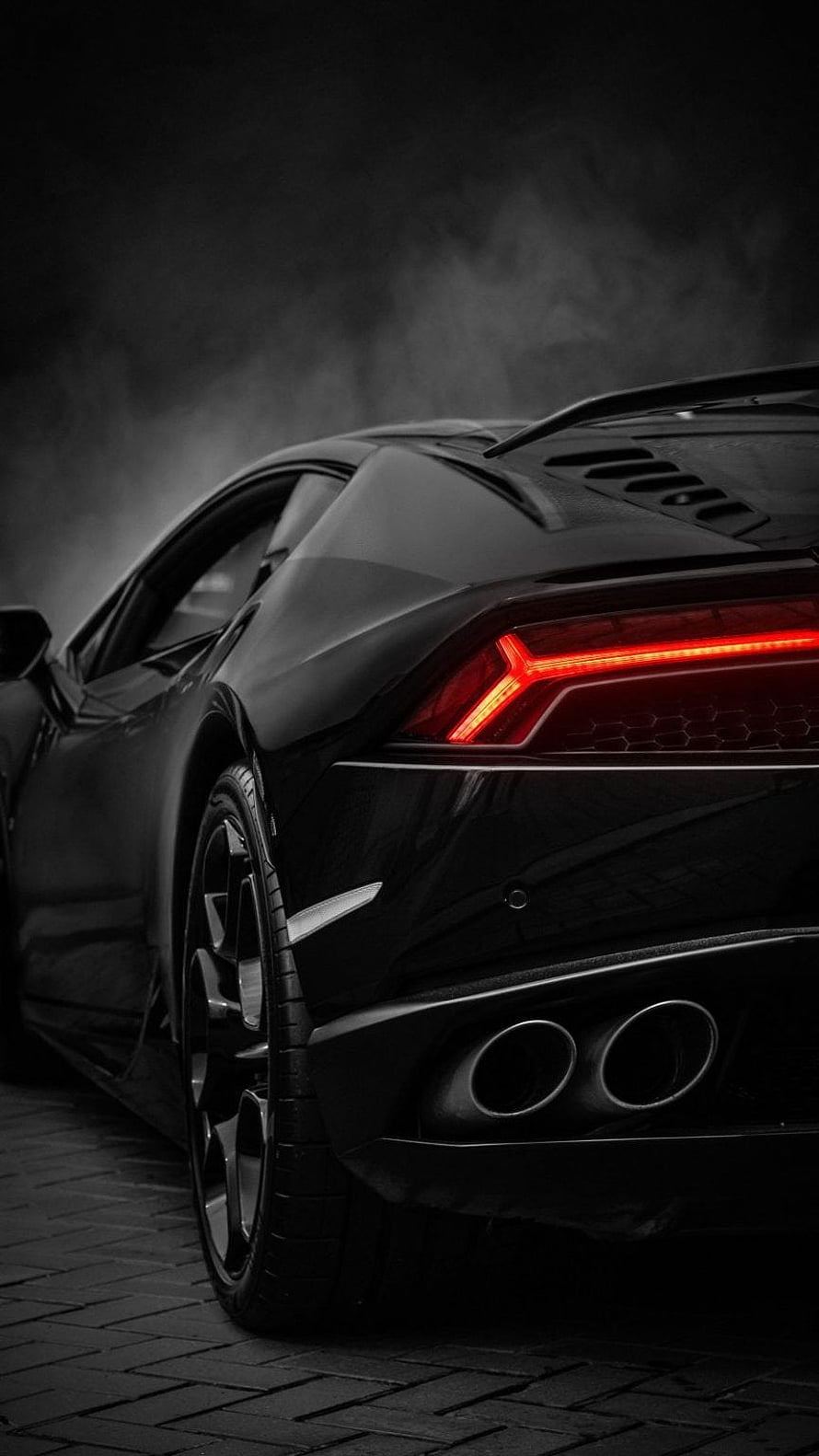 Black Lamborghini Huracan Rear View With Glowing Red Taillights And Dual Exhaust HD phone wallpaper