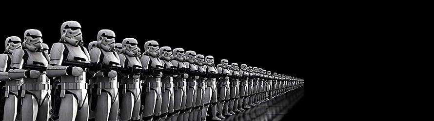Stormtroopers standing in formation with blasters against a black background HD wallpaper
