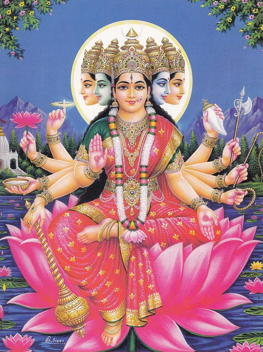 Gayatri Devi seated on a pink lotus with multiple arms and five faces in traditional Indian art HD phone wallpaper
