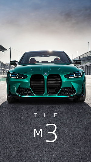 BMW M3 in Green on a Race Track with Dramatic Lighting HD phone wallpaper