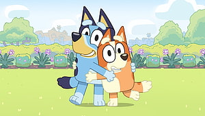 Bluey and Bingo Hugging in a Sunny Garden with Flowers and Trees HD wallpaper