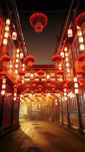 Traditional Chinese Alleyway Illuminated by Red Lanterns at Night HD phone wallpaper