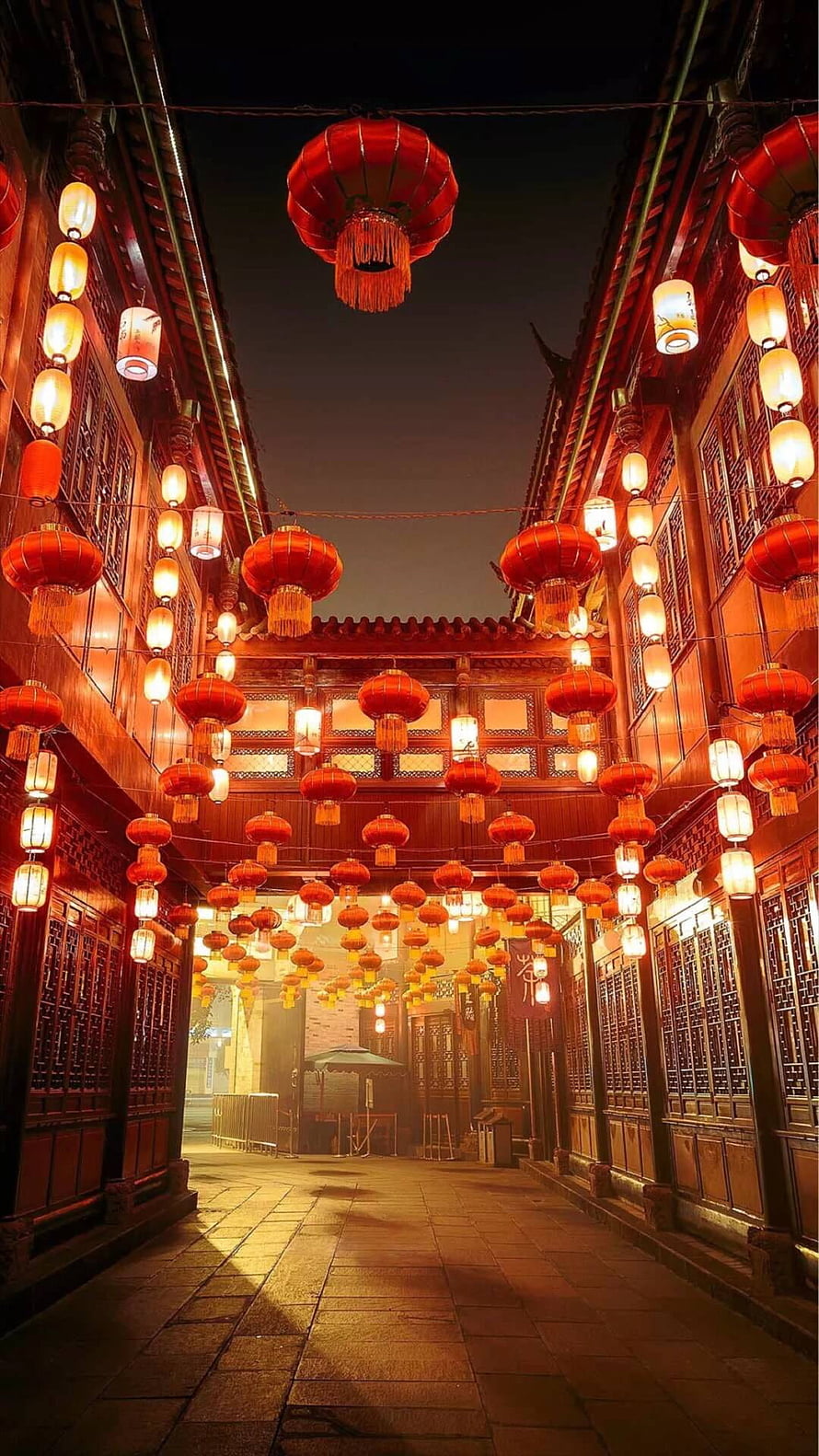Traditional Chinese Alleyway Illuminated by Red Lanterns at Night HD phone wallpaper