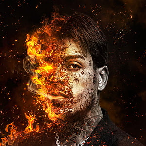 MC Kevin Fênix: Dramatic Portrait of a Tattooed Man with Burning Fire Effects, Fênix. Discografia de MC Kevin - LETRAS.MUS.BR HD phone wallpaper