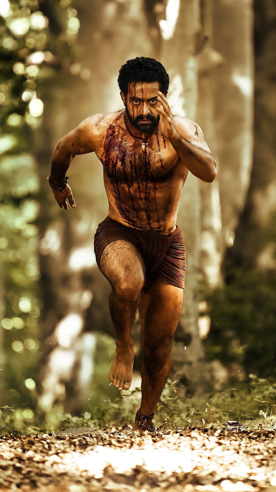 Komaram Bheem Running Through Forest in RRR Film Still HD phone wallpaper