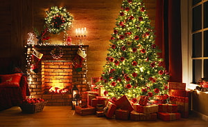 Cozy Christmas living room with lit tree, fireplace, stockings, and wrapped gifts HD wallpaper