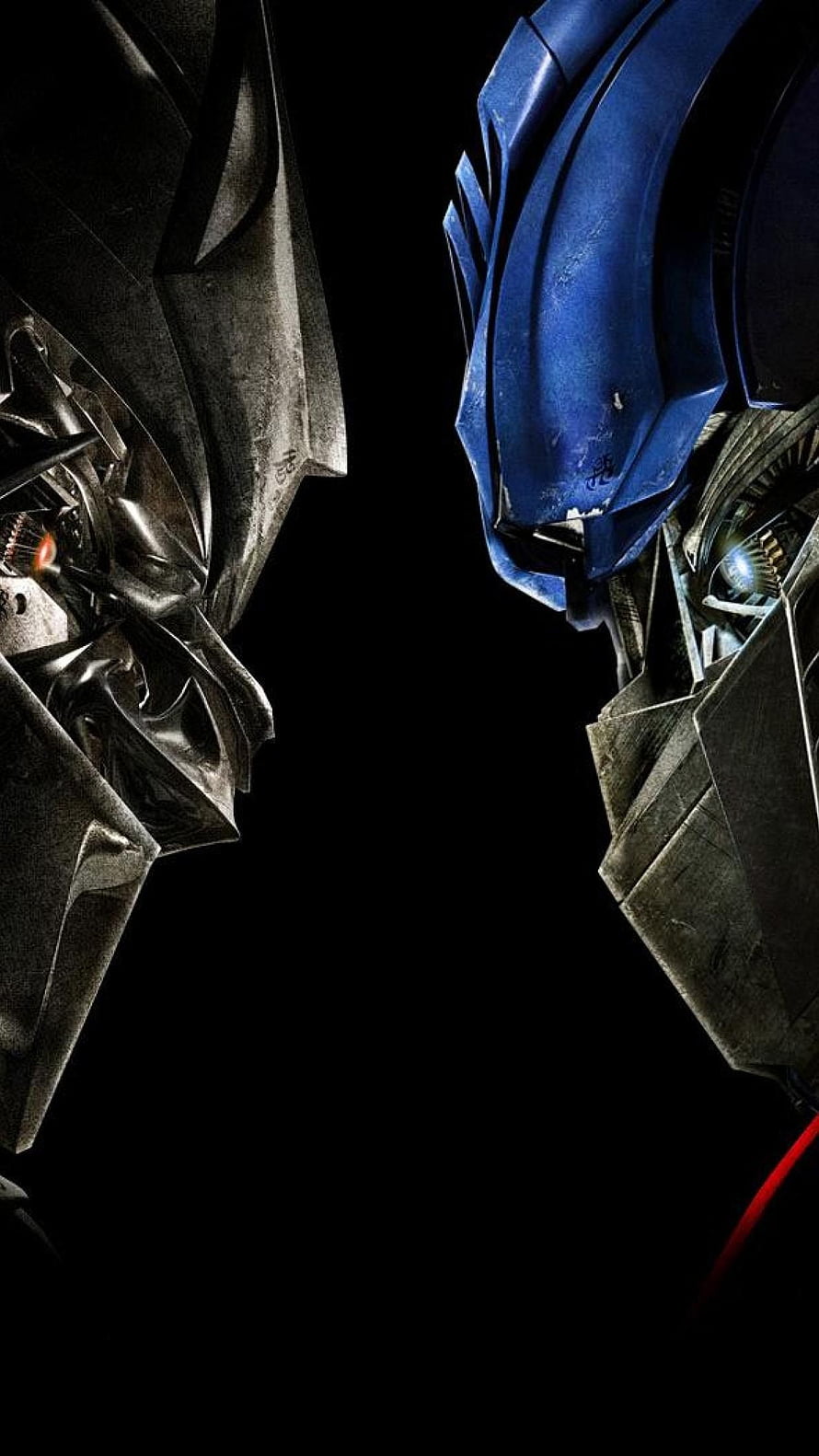 Transformers Optimus Prime and Megatron Face Off in Cinematic Close-Up HD phone wallpaper
