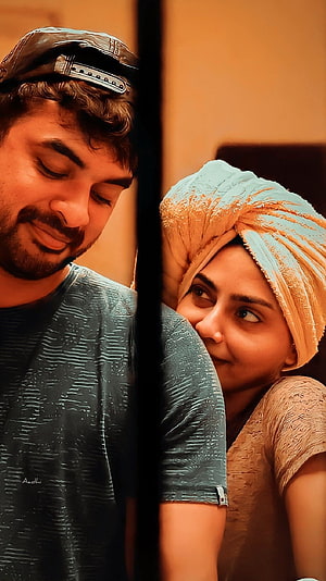 Mayanadhi Movie Still Featuring Tovino Thomas and Aishwarya Lakshmi in Warm Indoor Scene HD phone wallpaper