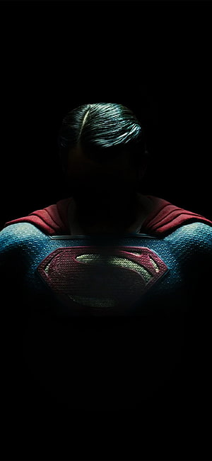 Dark and moody Superman chest emblem close-up with red cape and textured blue suit in shadow, Superman - , Superman Background on Bat, Captain America AMOLED HD phone wallpaper