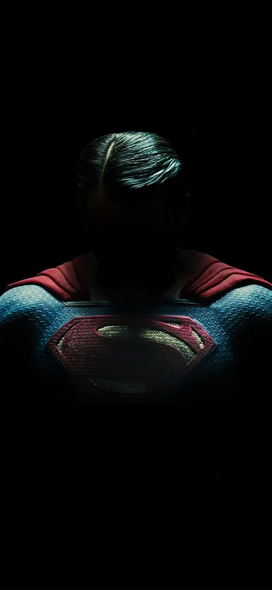 Dark and moody Superman chest emblem close-up with red cape and textured blue suit in shadow, Superman - , Superman Background on Bat, Captain America AMOLED HD phone wallpaper