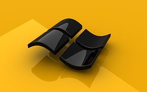 Glossy Black Microsoft Windows Logo on Vibrant Yellow Background HD wallpaper