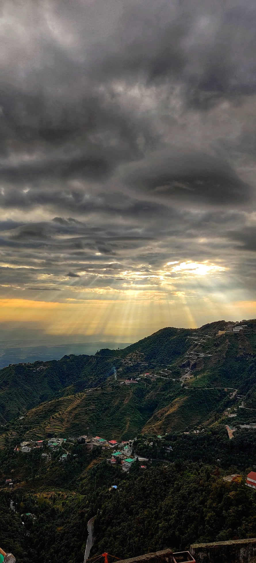 Mussoorie India Mountain View with Dramatic Sunbeams Breaking Through Storm Clouds Over Lush Green Hills HD phone wallpaper