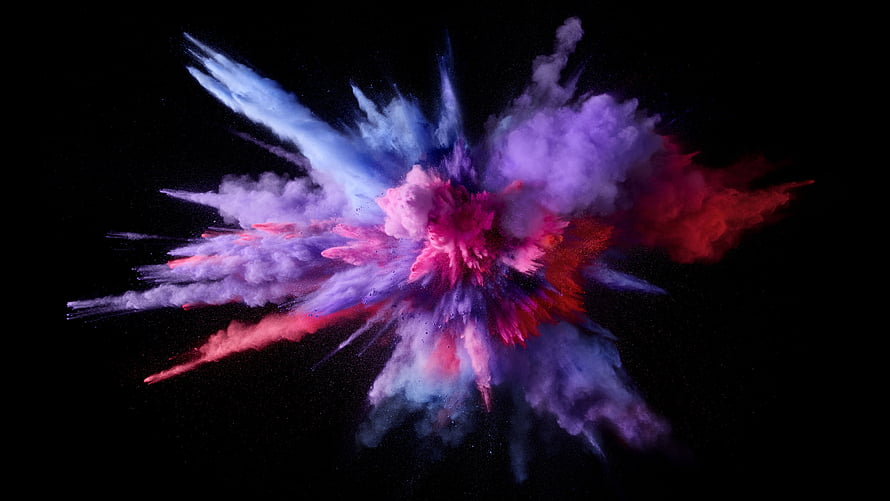 Vibrant Multicolor Powder Explosion Bursting Against Black Background HD wallpaper