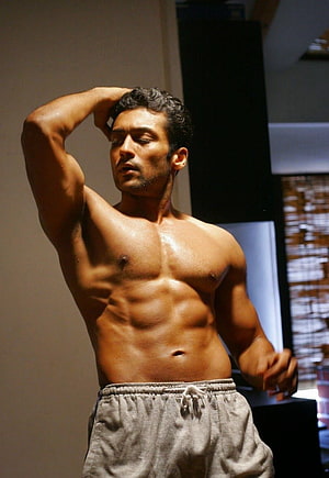 Vaaranam Aayiram: Shirtless Male Actor With Defined Abs In Grey Sweatpants HD phone wallpaper