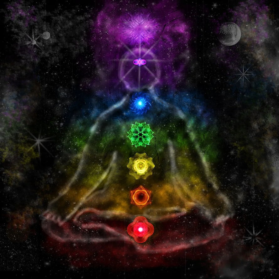Meditating Figure with Seven Glowing Chakra Energy Centers Against a Cosmic Starry Background HD phone wallpaper