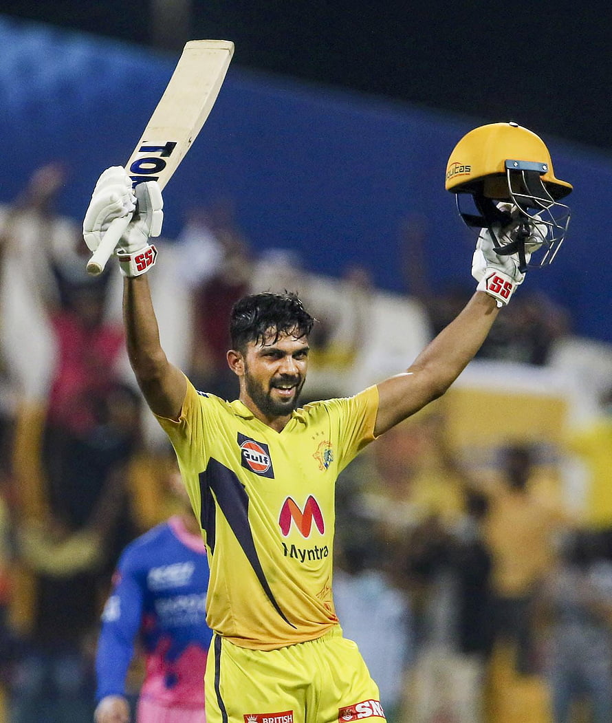 Ruturaj Gaikwad celebrates century with bat and helmet raised in Chennai Super Kings yellow jersey HD phone wallpaper