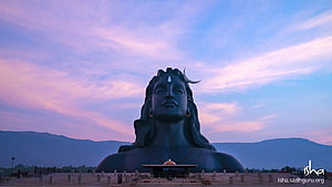 Adiyogi Shiva Statue at Isha Yoga Center Against a Purple Sunset Sky HD wallpaper