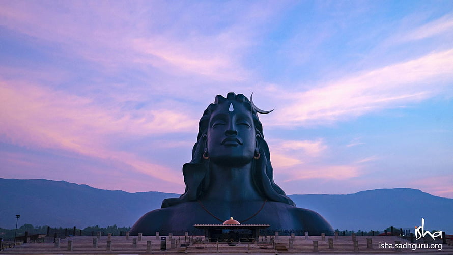 Adiyogi Shiva Statue at Isha Yoga Center Against a Purple Sunset Sky HD wallpaper
