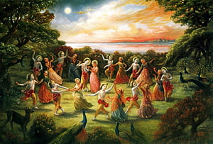 Radha Krishna Raas Leela: Divine Dance in a Lush Forest at Sunset HD wallpaper