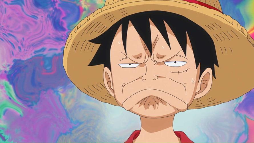 Monkey D. Luffy from One Piece wearing straw hat with serious expression against colorful background HD wallpaper