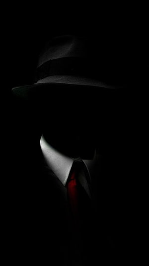 Mysterious Silhouette in Fedora Hat and Red Tie Against Black Background HD phone wallpaper