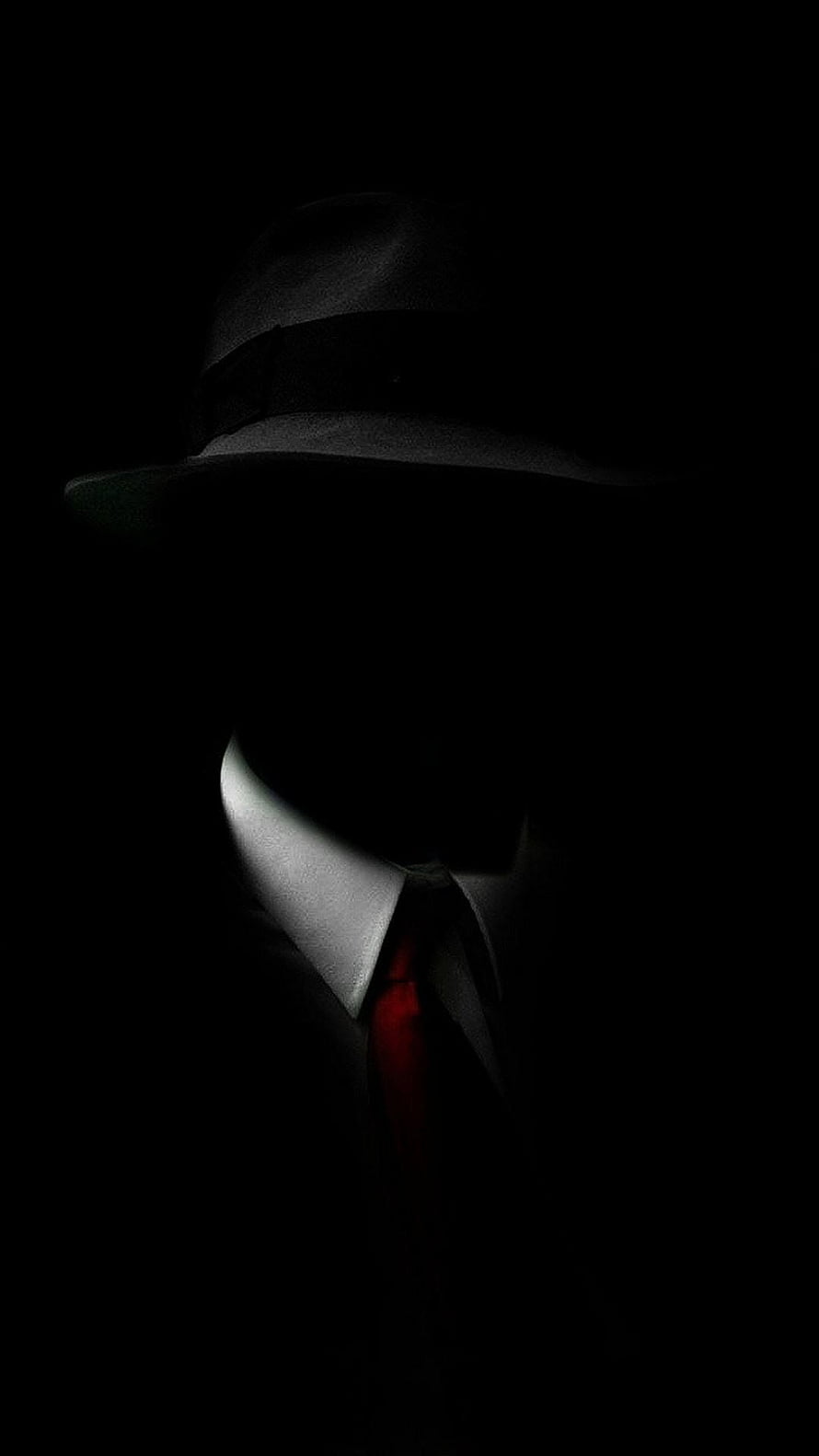 Mysterious Silhouette in Fedora Hat and Red Tie Against Black Background HD phone wallpaper