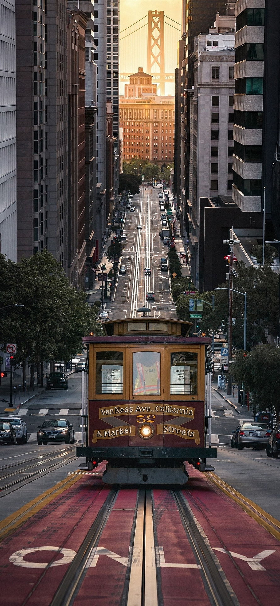 San Francisco Cable Car on Market Street with Bay Bridge at Sunset HD phone wallpaper