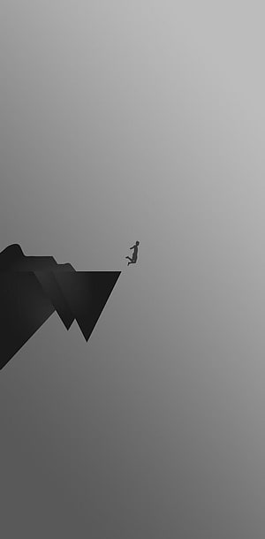Minimalist Silhouette of a Person Leaping from a Dark Cliff Edge Against a Grey Gradient Background HD phone wallpaper