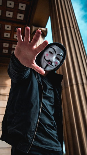 Anonymous Hacker Wearing Guy Fawkes Mask Reaching Hand Forward HD phone wallpaper