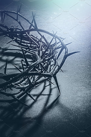 Crown of Thorns on Dark Stone Surface with Dramatic Lighting and Shadows HD phone wallpaper