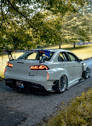 White Mitsubishi Lancer Evolution X with Widebody Kit and Large Rear Wing HD phone wallpaper