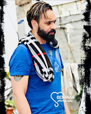 Portrait of a man with a beard and blue shirt wearing a striped scarf, . . Picpile: Babbu Mann ., Babbu Maan HD phone wallpaper