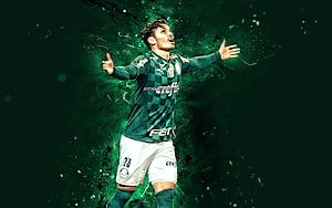 Raphael Veiga in Palmeiras green checkered kit with arms outstretched against a dark green particle background HD wallpaper