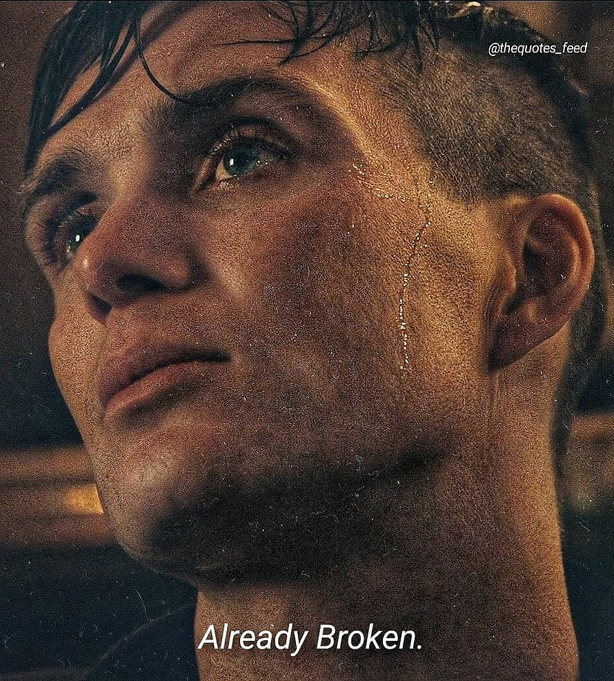 Thomas Shelby from Peaky Blinders in a Gritty Close-Up Portrait with Intense Blue Eyes HD phone wallpaper