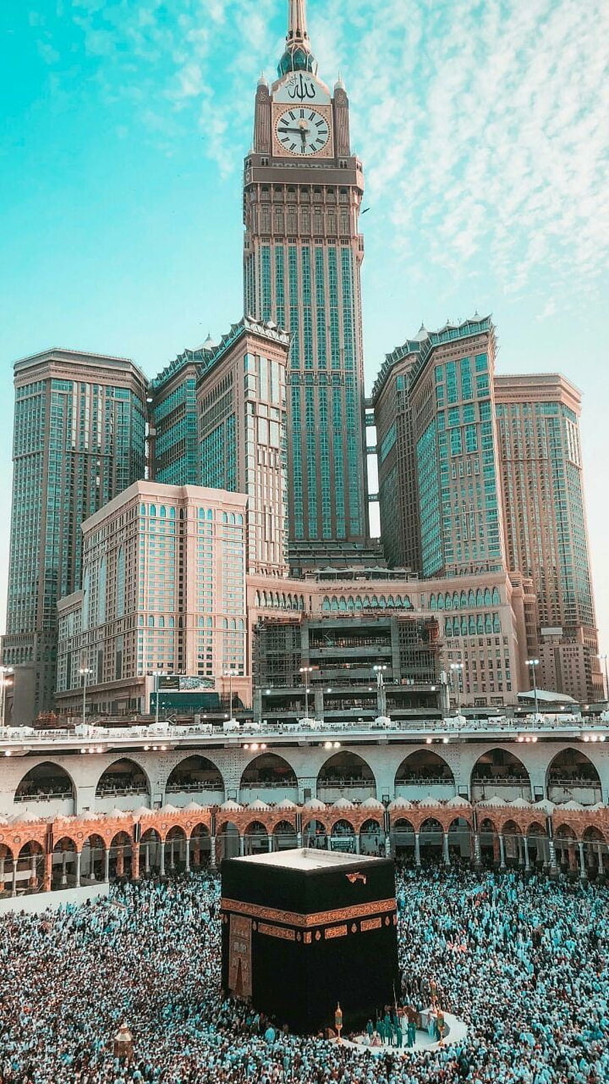 Kaaba in Mecca with Abraj Al Bait Clock Tower and Pilgrims HD phone wallpaper