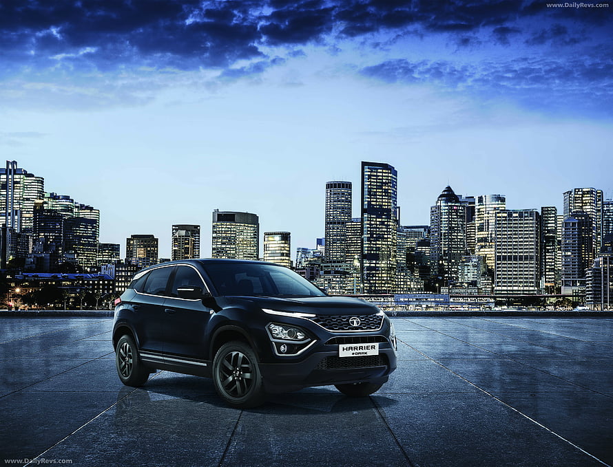 Black Tata Harrier SUV Parked on Rooftop with City Skyline at Dusk HD wallpaper