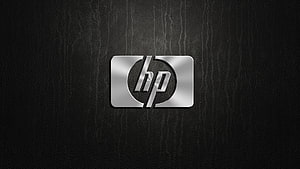 HP Logo on Dark Textured Background with Metallic Silver Finish HD wallpaper