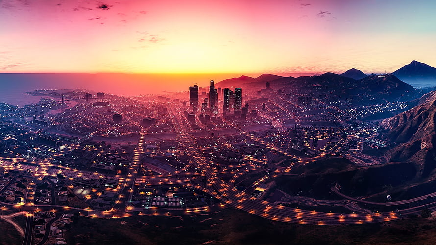 Grand Theft Auto V Los Santos Cityscape at Sunset with Glowing Highways and Mountains HD wallpaper
