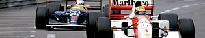 Classic Formula 1 Racing Cars on the Track with Sponsor Livery HD wallpaper