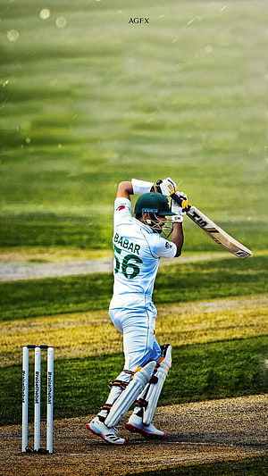 Babar Azam Cricket Player in Action Wearing Pakistan Jersey and Helmet HD phone wallpaper