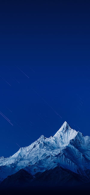 Snowy Mountain Peak Under Starry Night Sky With Meteor Trails HD phone wallpaper