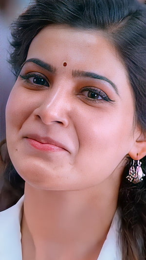 Portrait of a woman with a bindi, dark hair, and a white top, looking up with a gentle expression, Samantha Akkineni, telugu actress HD phone wallpaper